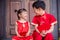 Brother and sister wearing chinese traditional dress