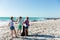 Brother and sisters having fun at the beach