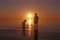 Brothers playing in the water at the Great Salt Lake beach