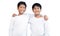 Brothers wearing white long-sleeved T-shirts smile and show joy together