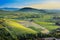 Brouilly hill and vineyards with morning lights in Beaujolais land, France