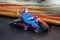 Brovary, Ukraine, 26.02.2009 A man is in a go-kart on the karting track in moving indoors