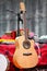 Brown acoustic guitar