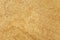 Brown adobe clay wall texture background.