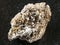 brown Astrophyllite crystals in Natrolite stone