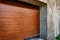 Brown automatic sectional metal garage doors.