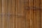 Brown bamboo wooden wall background, dirty laminate floor, plywood texture