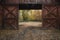 Brown barn on farm landscape