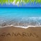 Brown beach sand with written word Canarias