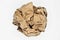 Brown and beige crumpled paper ball.