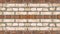 Brown beige damaged rustic brick wall texture background