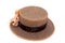 A brown boater hat