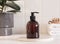 Brown bottle mockup for bathing products in bathroom