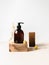 Brown bottle mockup for bathing products on wood podium