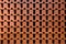 Brown brick wall layered in a beautiful unusual pattern. Background photo