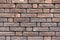 Brown brick wall texture. Grungy brickwall. Exterior or loft style bricks texture background