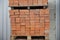 Brown bricks batch on wooden storage tray