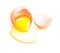Brown broken egg with flowing yolk