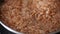 Brown buckwheat porridge cooked in a pan