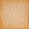 Brown canvas with the texture of crumpled paper. grunge background. Vector