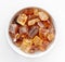 Brown caramelized sugar cubes on a white background