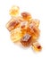 Brown caramelized sugar cubes on a white background