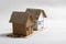 Brown cardboard home miniature isolated