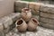 Brown ceramic stacked garden pots