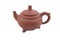 Brown ceramic teapot with legs
