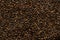 Brown chia seeds texture background