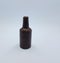 Brown chocolate bottle candy on white background