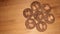 brown chocolate cookies isolated on wooden background