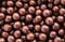 Brown chocolate dragee balls background