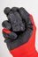 Brown coal nuggets held in hand. Material for heating homes on a work glove
