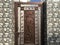 Brown color galvanised enamel painted prefabricated single leaf wicked gate for an villa backside and flower designed in the gate