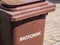 Brown compost bin in german
