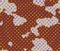 Brown cow fur with white spots and sparkling multicolored diamonds. Seamless pattern