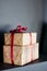 Brown craft boxes with red ribbon