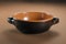 Brown earthenware casserole typical of Tuscany