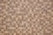 Brown earthenware floor tile background