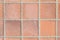 Brown earthenware floor tile seamless background
