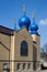 Brown Eastern Orthodox Church with Blue Minarets