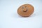 Brown egg with smile drawn on it with a sharp pencil