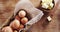 Brown eggs and butter cubes on wooden table 4k