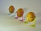 Brown eggs of light color prepare for the holiday Easter against the background from a white rope and dark branches of a tree with