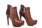 Brown female high-heeled boots