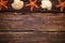 Brown fishing net, starfish and shell on wooden background