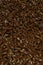 Brown Flax seed. Also known as Linseed, Flaxseed and Common Flax. Closeup of grains, background use