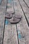 brown flip flops slippers on old wooden deck mooring background