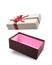 Brown flying open gift box with multicolored satin bow